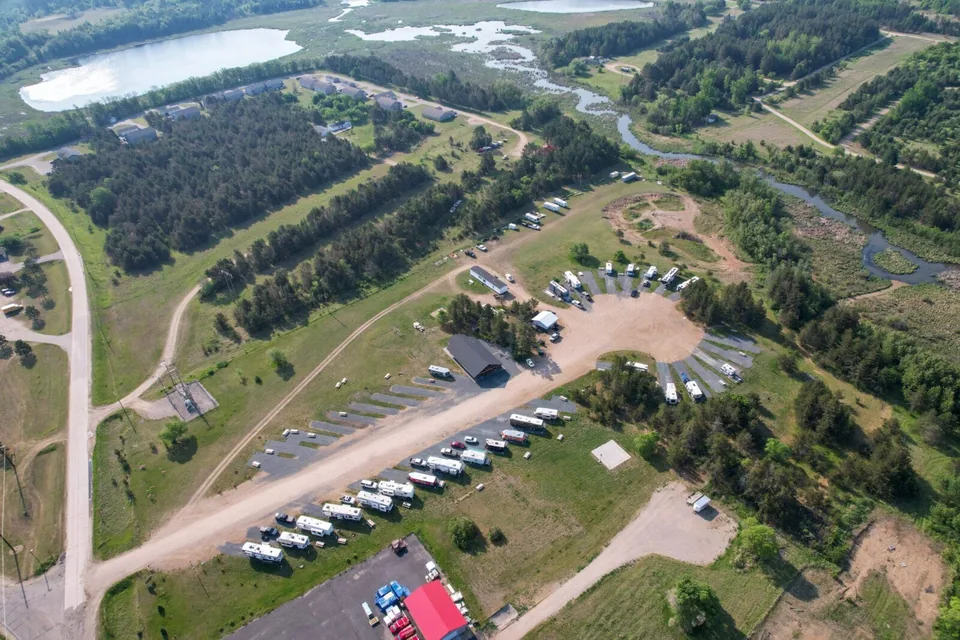 Aerial view of Grant Haven Campground, surrounded by northern Minnesota woods and water