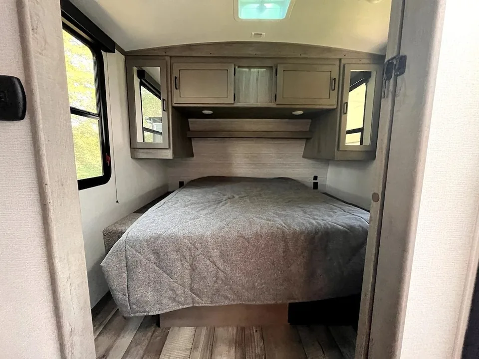 Bedroom inside the Grant Haven Suite rental camper