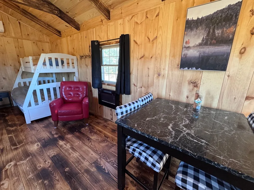 Dining table and seating in the Green Door Cabin