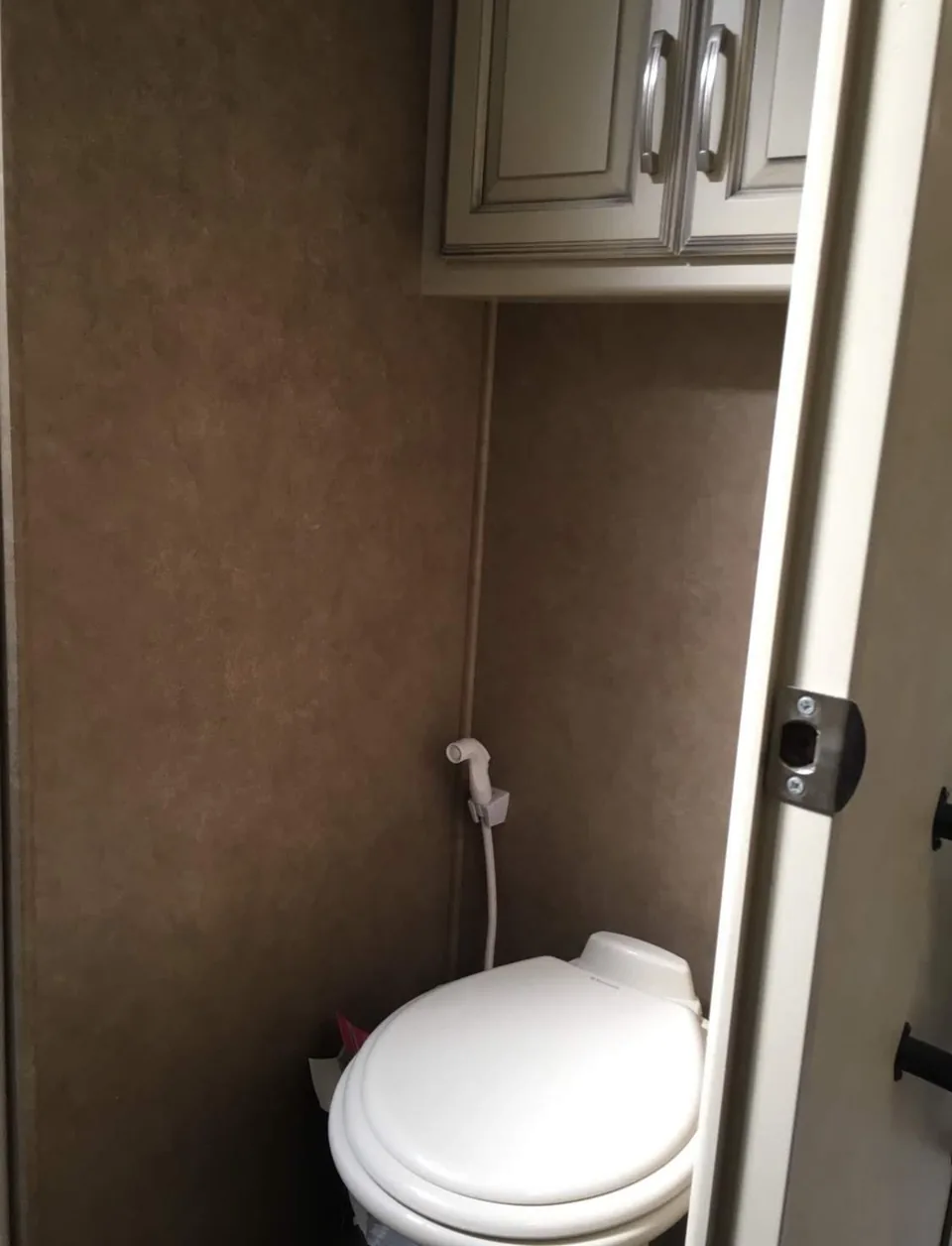 Private toilet compartment inside the Grant Haven Premier Suite